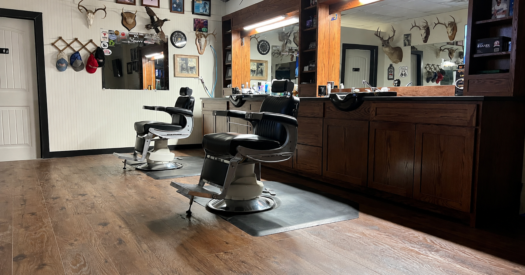 The barber chairs and wood cabinetry inside Lone Star Barber Shop